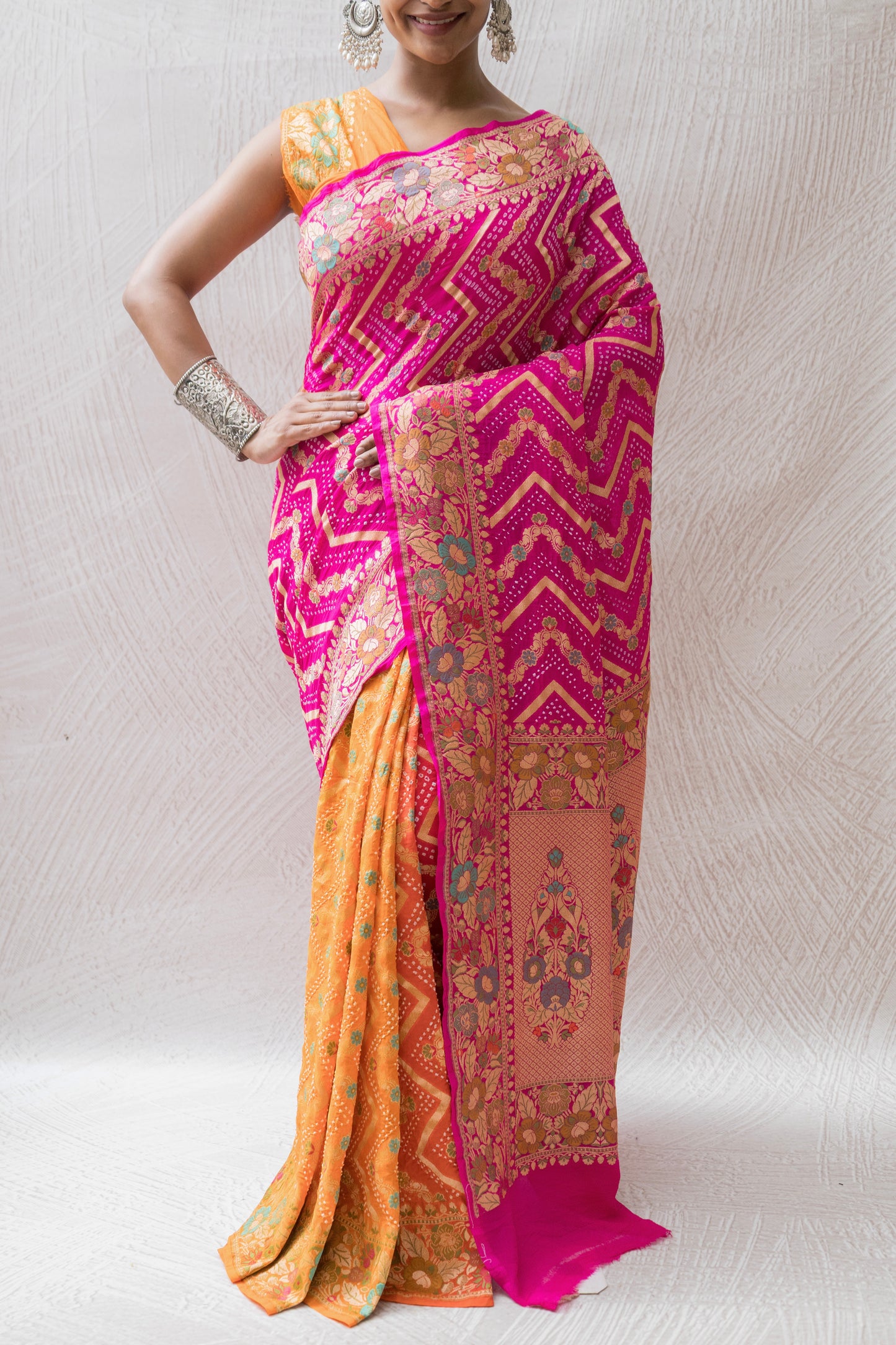 Georgette Neemzari Tilfi Zig-zag Yellow-Orange-Pink Bandhej Saree