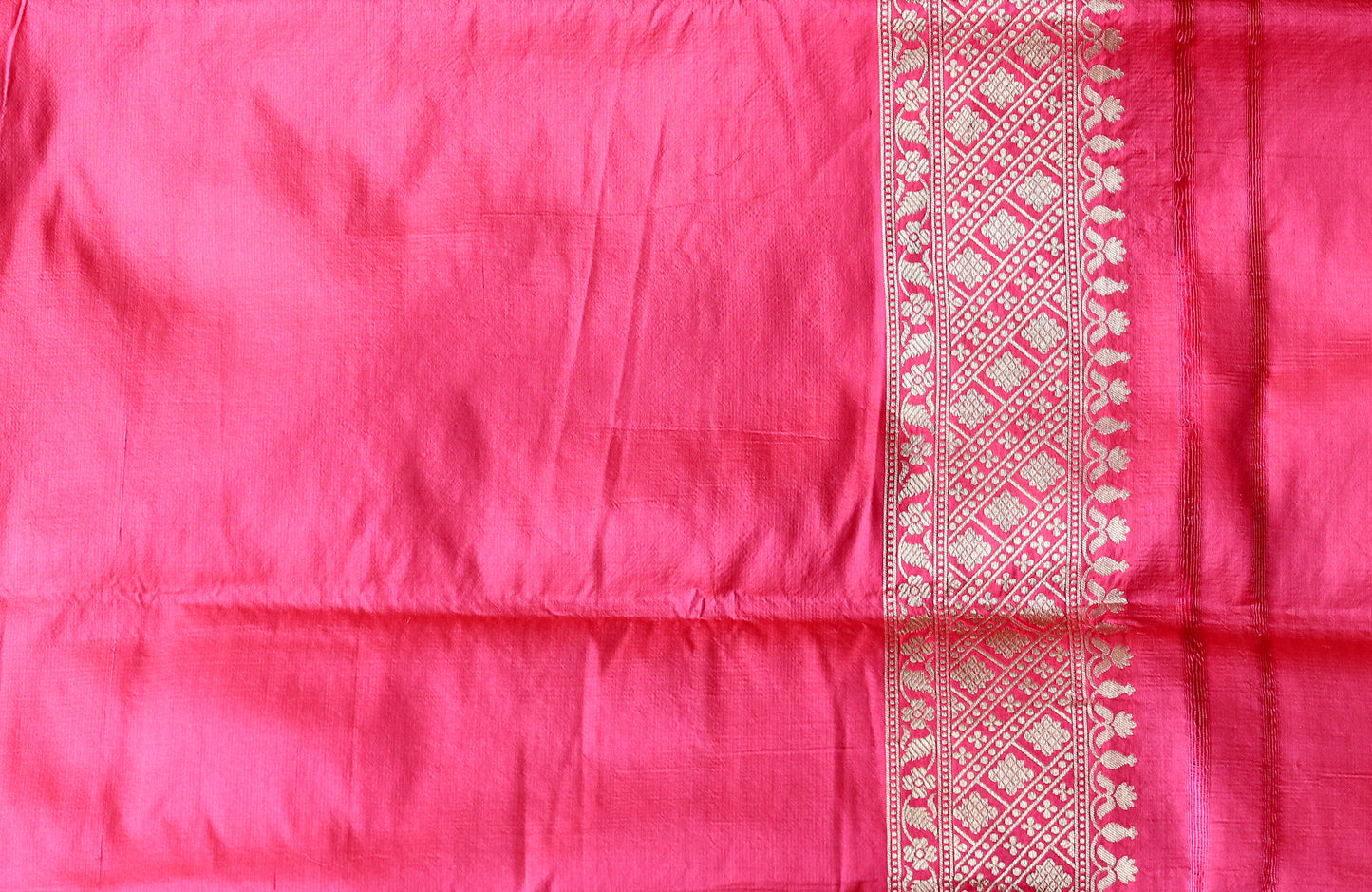Soft and elegant light pink Banarasi saree with exquisite traditional detailing