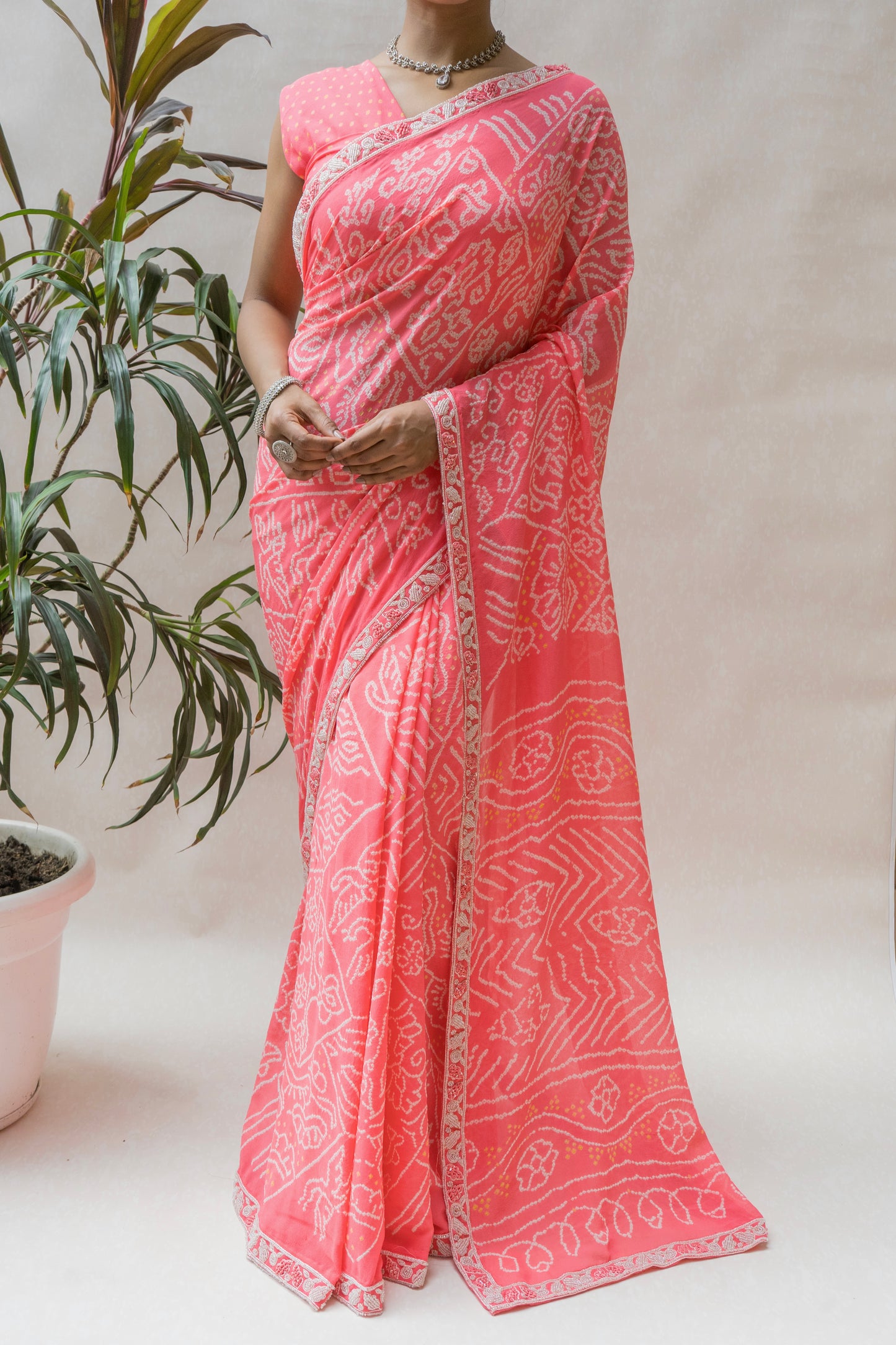 Georgette Hand Embroidered Border Intricate Pink Bandhej Saree