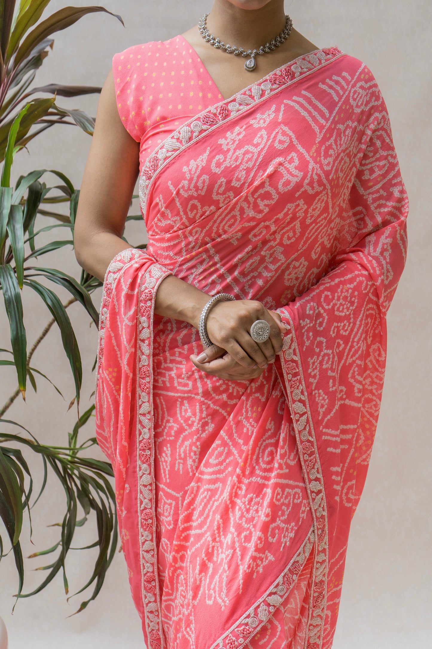 Georgette Hand Embroidered Border Intricate Pink Bandhej Saree
