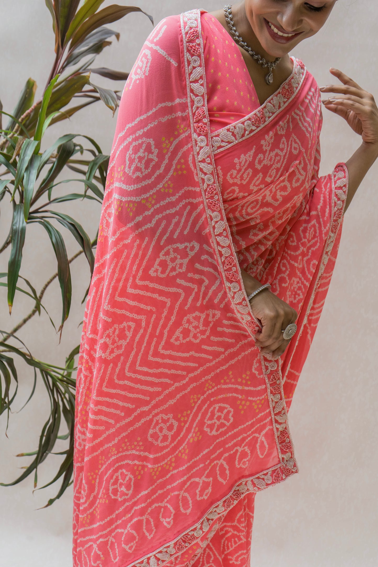 Georgette Hand Embroidered Border Intricate Pink Bandhej Saree