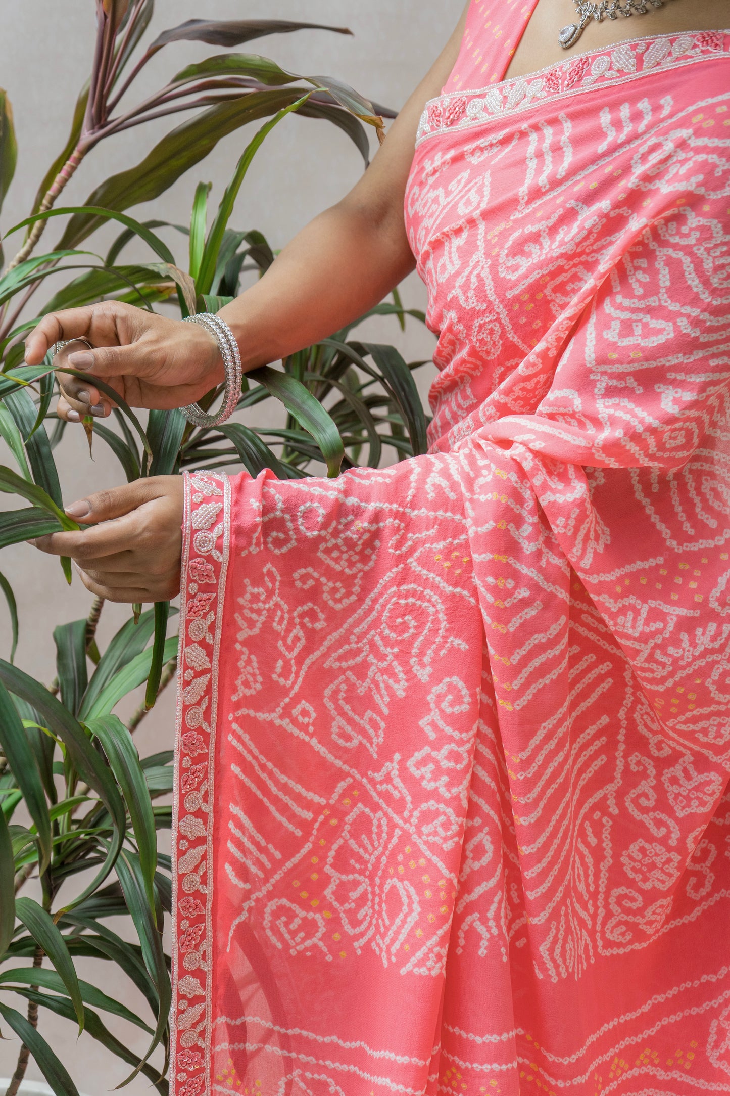 Georgette Hand Embroidered Border Intricate Pink Bandhej Saree
