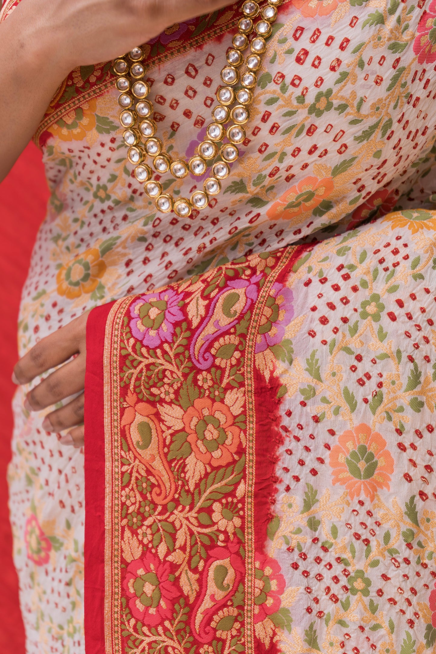 Georgette Floral Jaal Meenakari Bandhej White-Red Saree