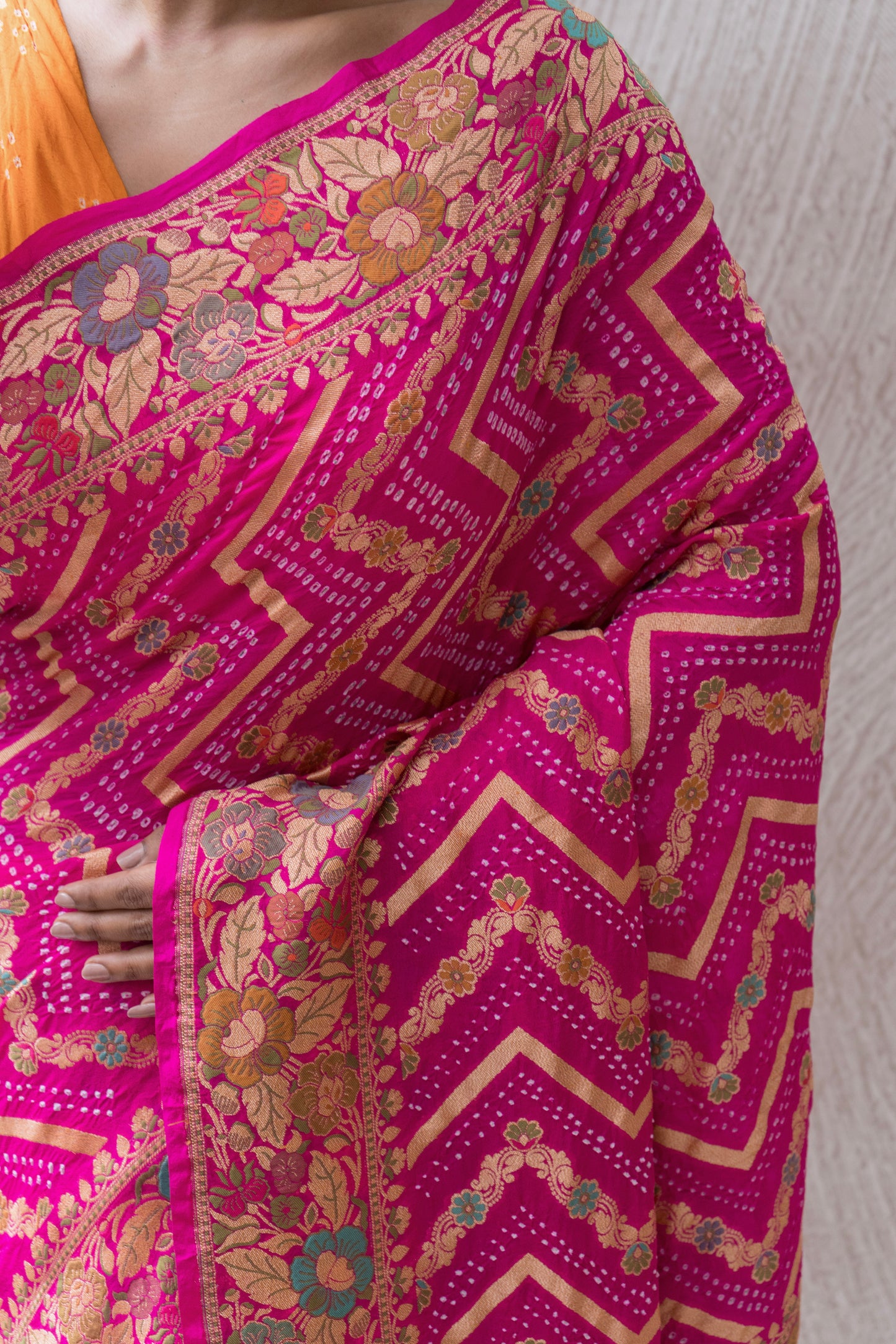 Georgette Neemzari Tilfi Zig-zag Yellow-Orange-Pink Bandhej Saree