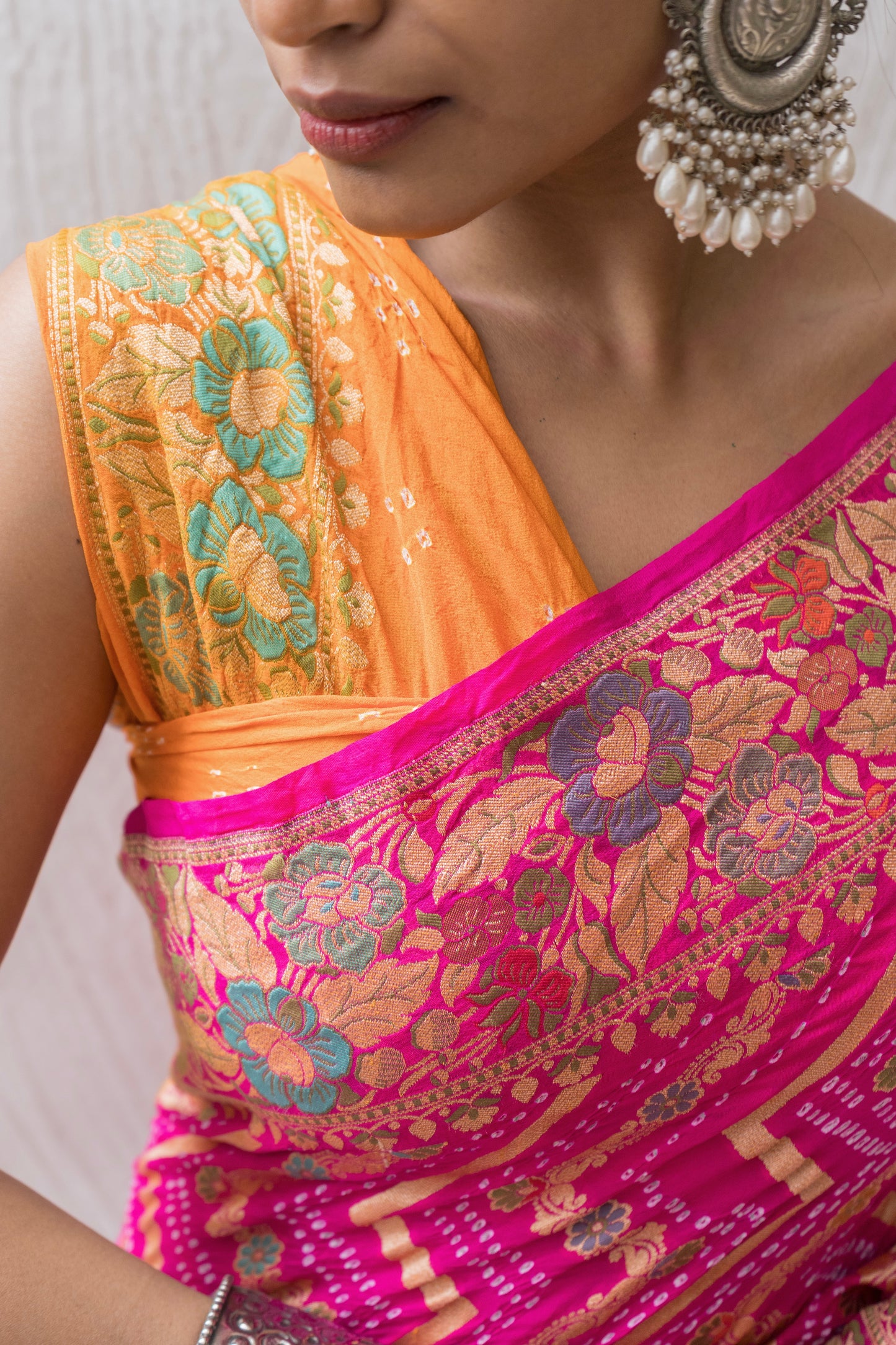 Georgette Neemzari Tilfi Zig-zag Yellow-Orange-Pink Bandhej Saree