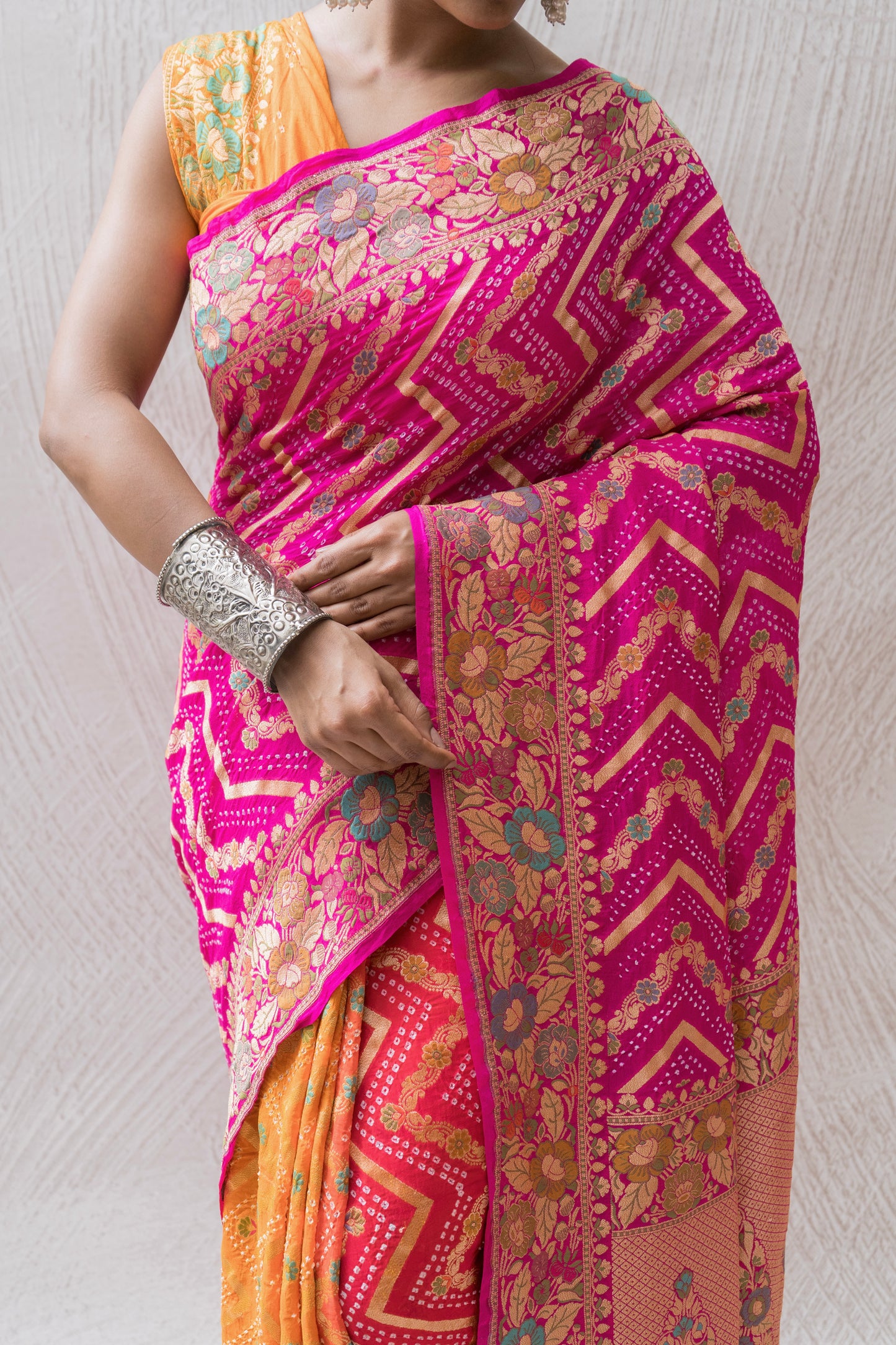Georgette Neemzari Tilfi Zig-zag Yellow-Orange-Pink Bandhej Saree