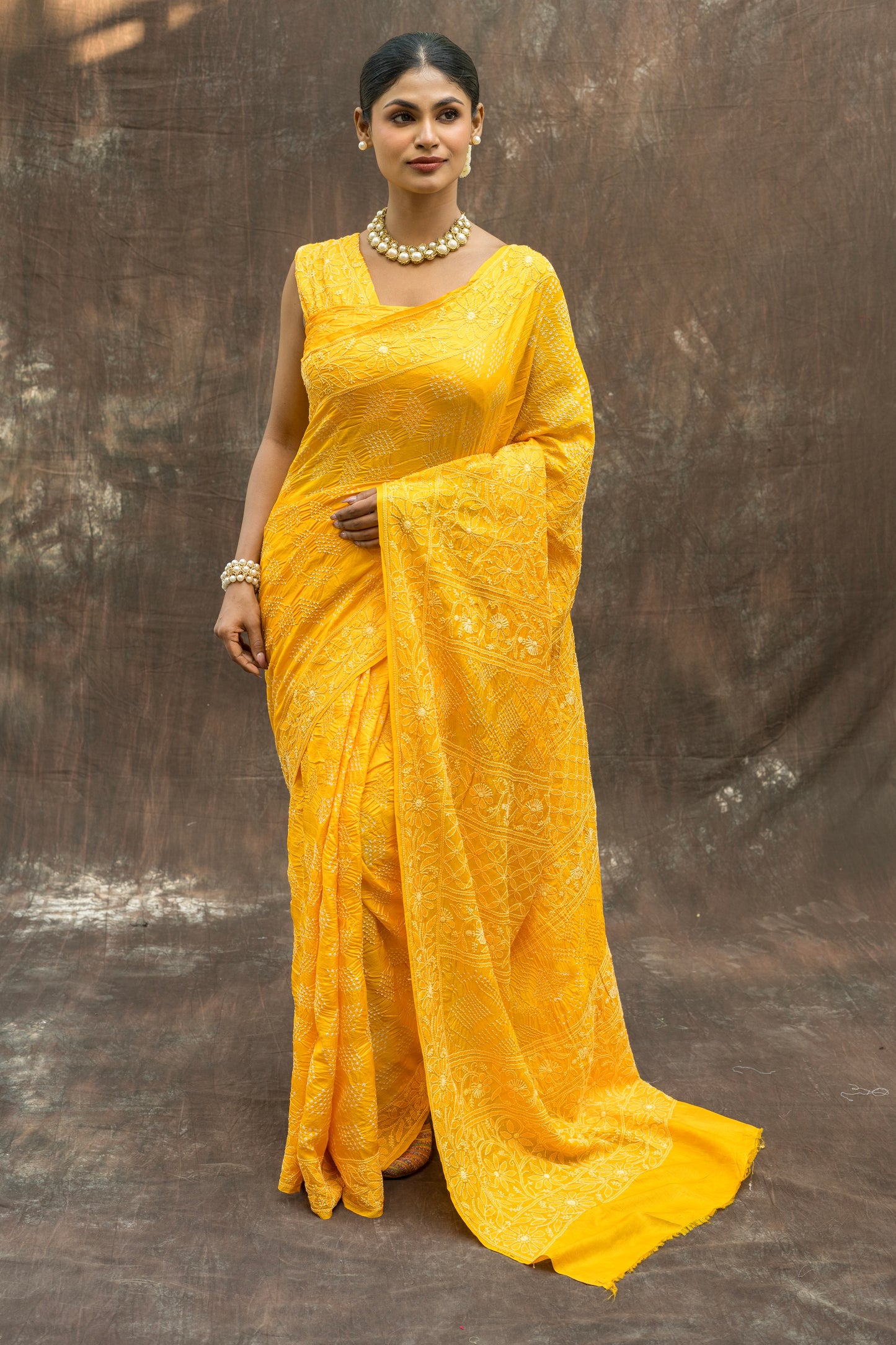 Tussar Lucknowi Rai-dana Yellow Bandhej Saree