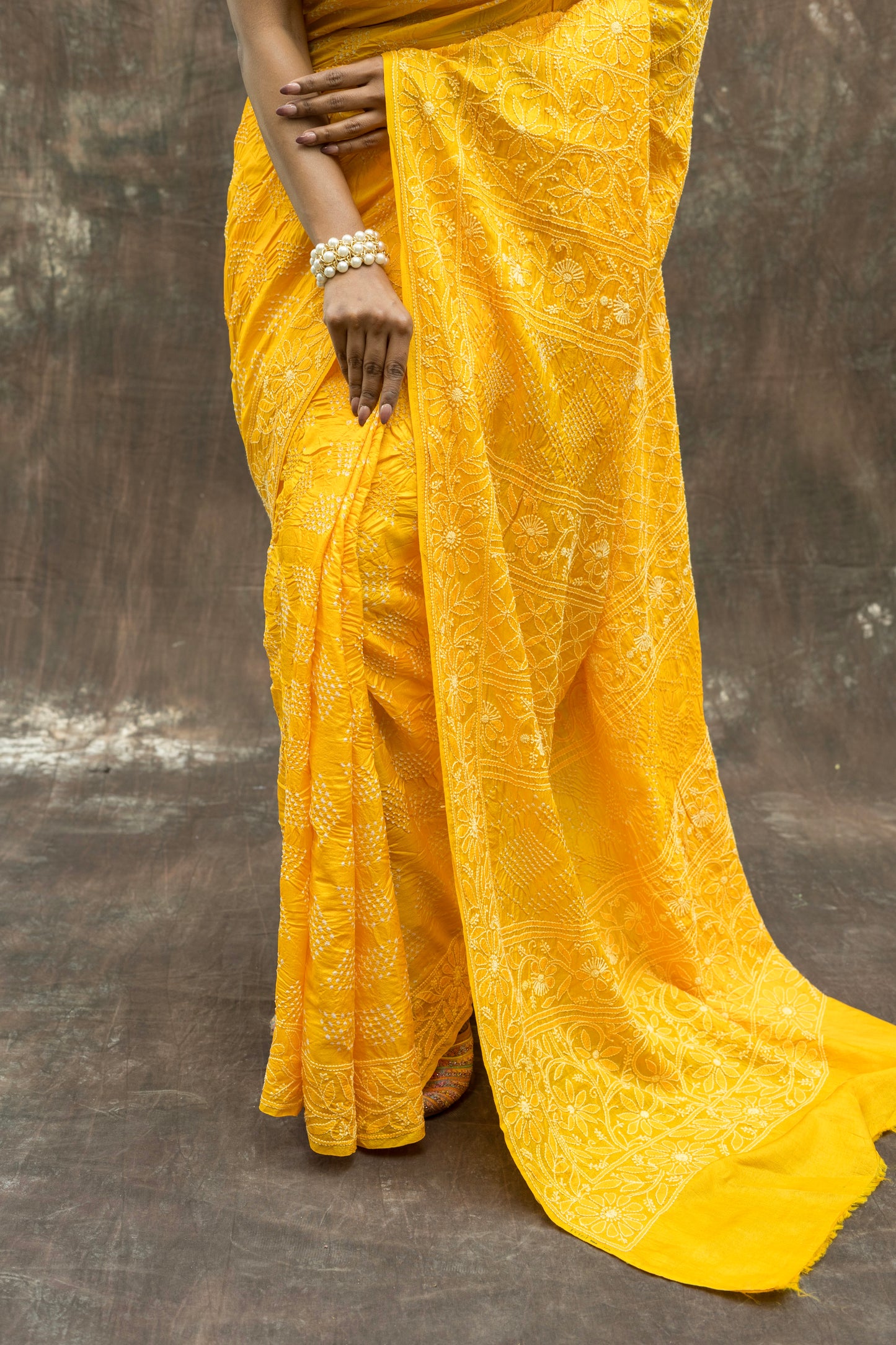 Tussar Lucknowi Rai-dana Yellow Bandhej Saree
