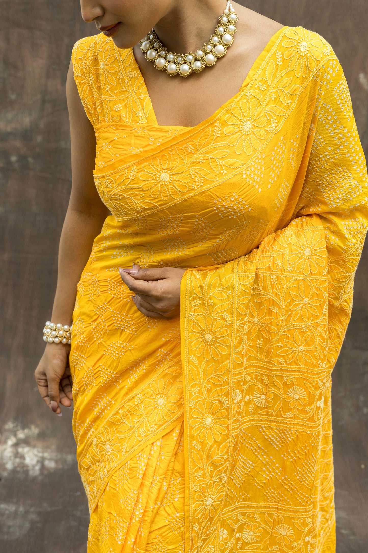 Tussar Lucknowi Rai-dana Yellow Bandhej Saree