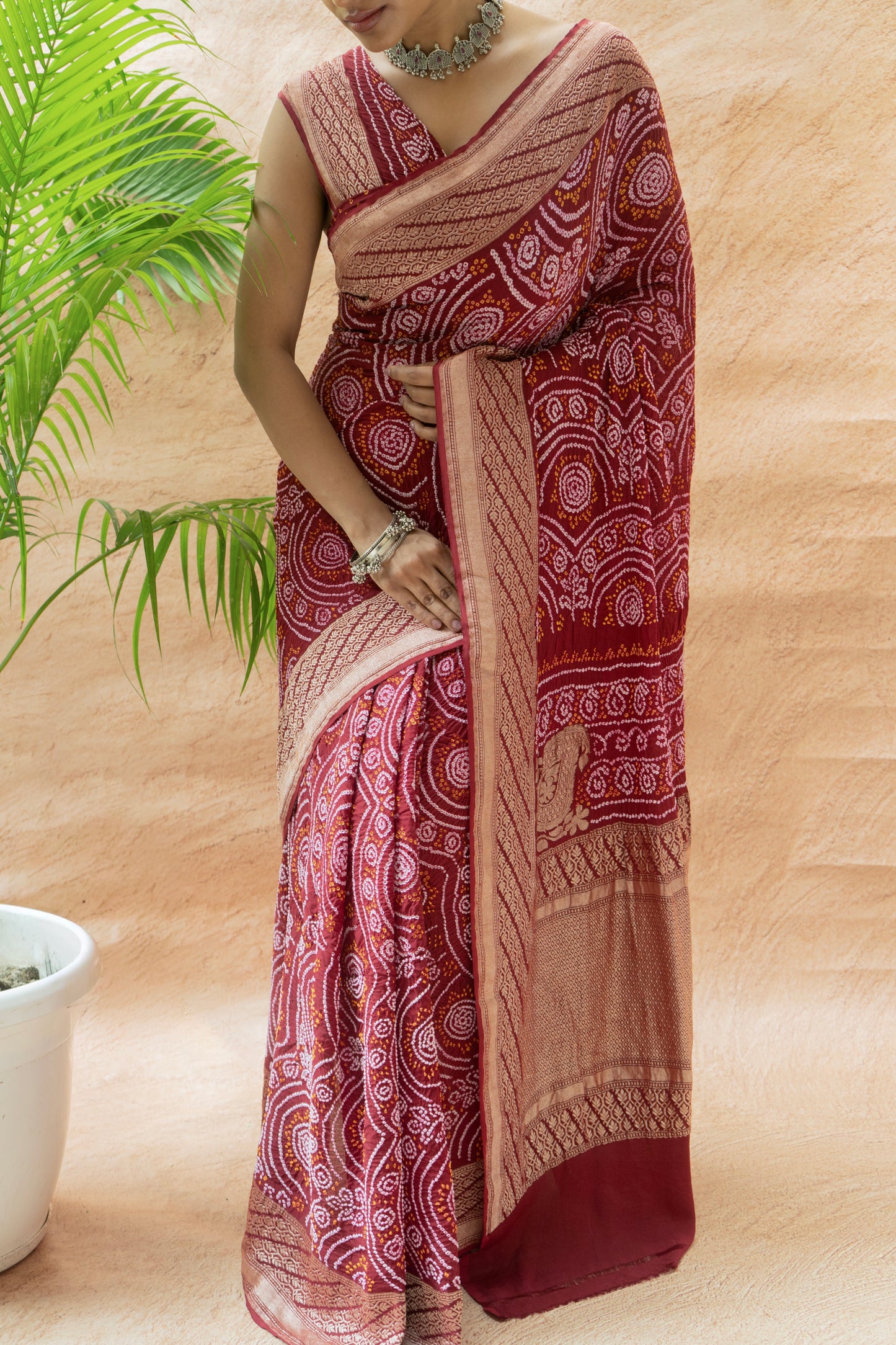 Georgette Rai Dana Reddish Maroon Bandhej Saree