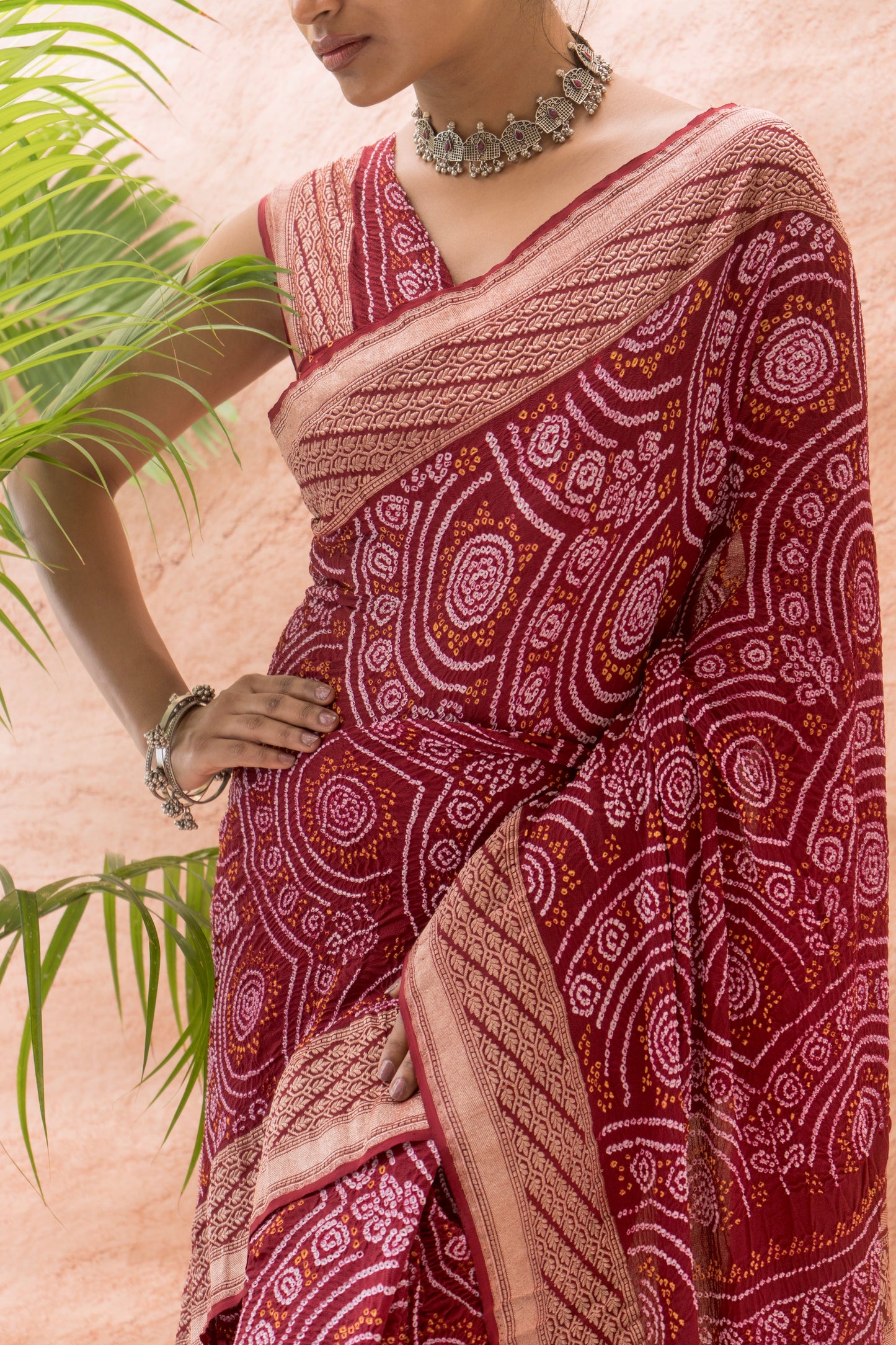 Georgette Rai Dana Reddish Maroon Bandhej Saree