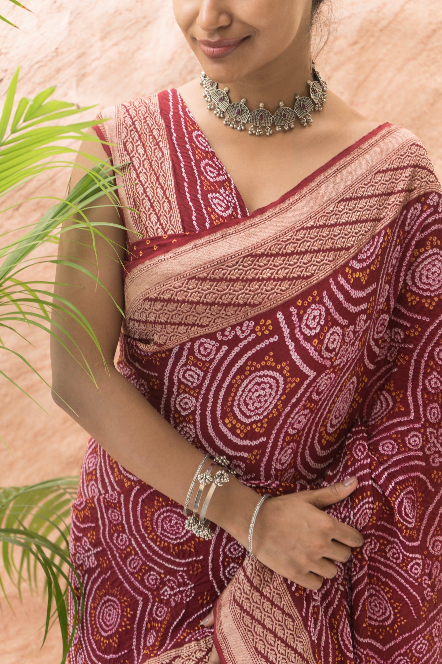 Georgette Rai Dana Reddish Maroon Bandhej Saree