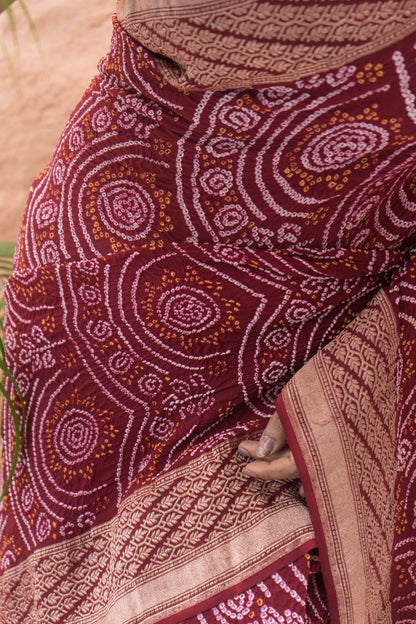 Georgette Rai Dana Reddish Maroon Bandhej Saree