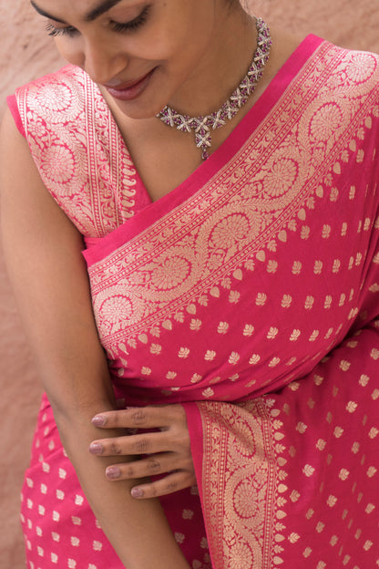 Handwoven red Moonga silk Banarasi saree for festive ethnic wear