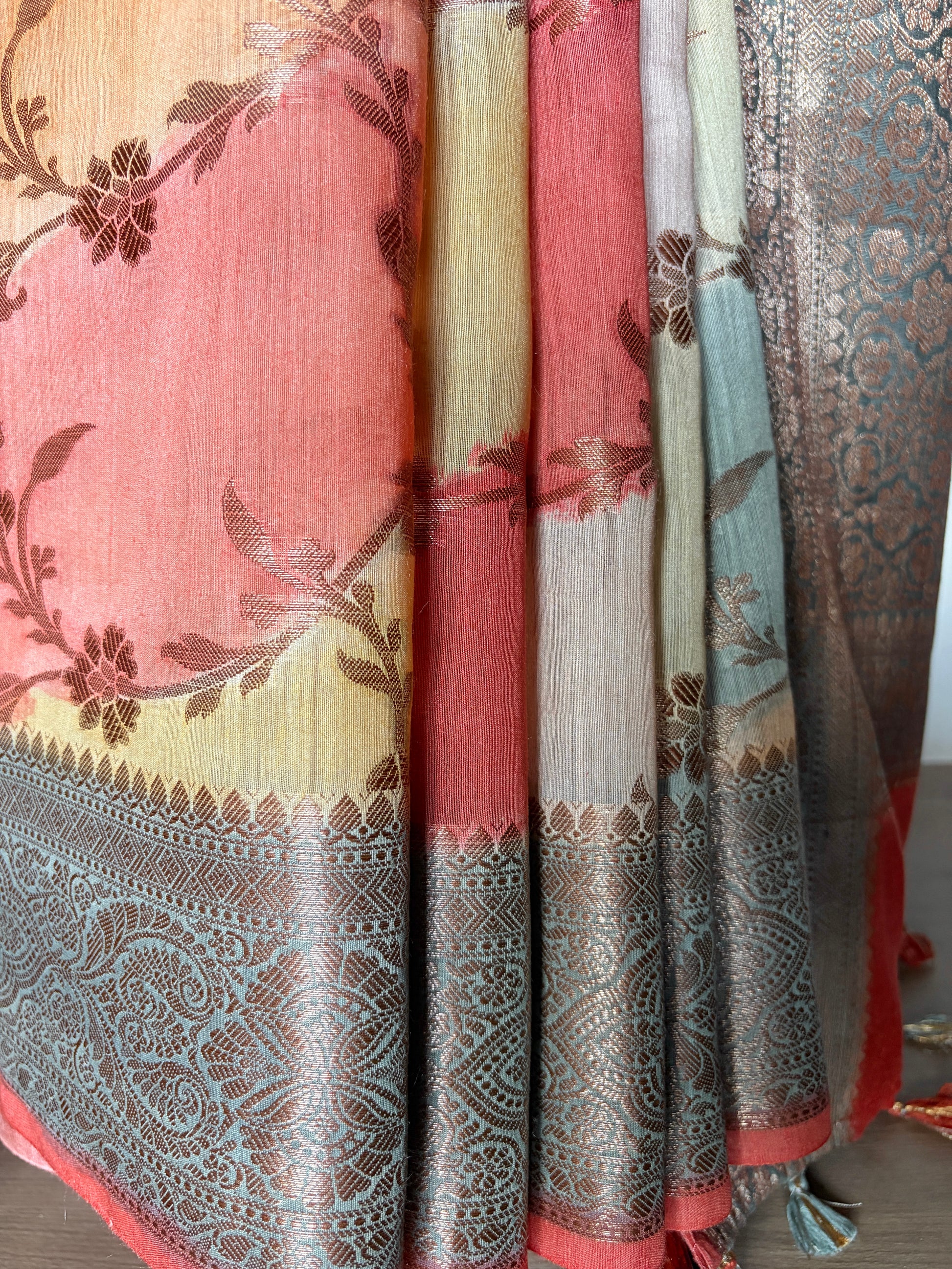 Floral patterned luxury Banarasi saree showcased on a mannequin with a white background