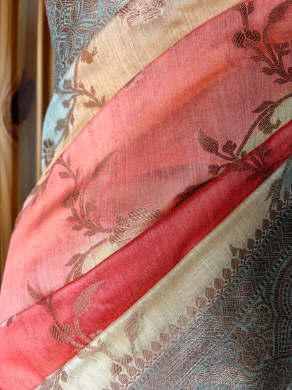 Floral design luxury Banarasi saree displayed on a mannequin against a white wall