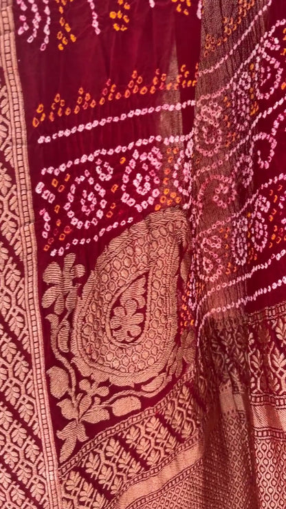 Georgette Rai Dana Reddish Maroon Bandhej Saree
