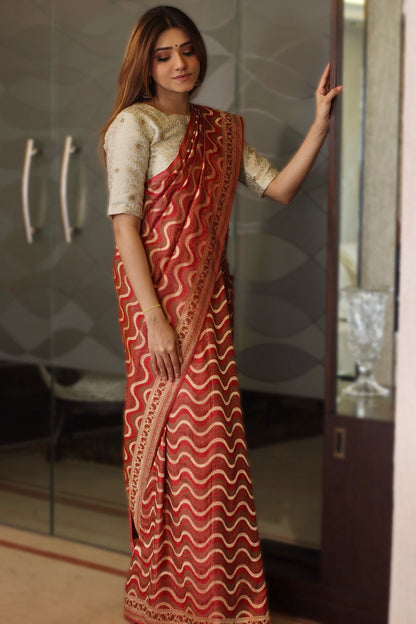 Vibrant red Banarasi beauty, crafted with exquisite traditional artistry