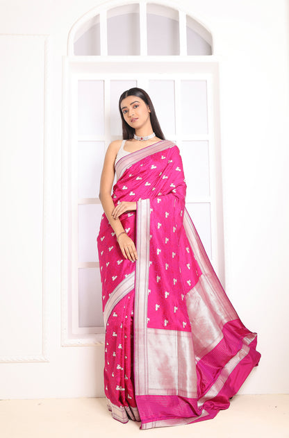 Pink Banarasi elegance woven with timeless charm and intricate detail.