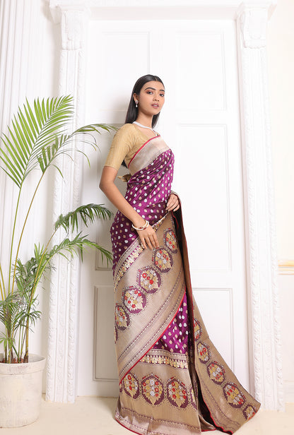 Purple Banarasi elegance with detailed silver-gold motifs, exquisite zari work, and a striking red blouse piece