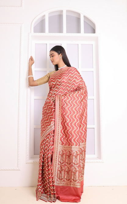 A beautiful red Banarasi saree with detailed motifs and classic appeal.