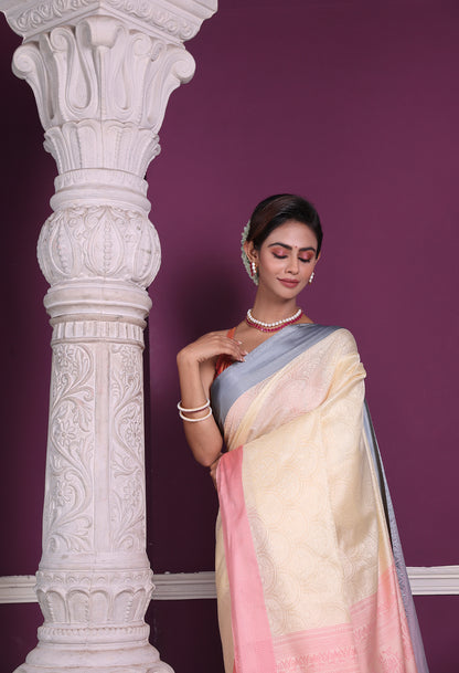 Handwoven lemon yellow and pink soft silk Banarasi saree for festive ethnic wear